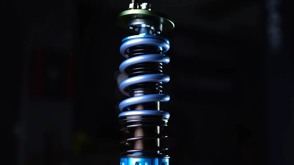 Close-up of a custom coilover suspension system, a key component in advanced car tuning