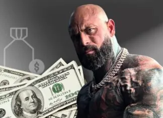 Tattooed, muscular man wearing chains in front of U.S. $100 bills and a money bag icon on a gray background