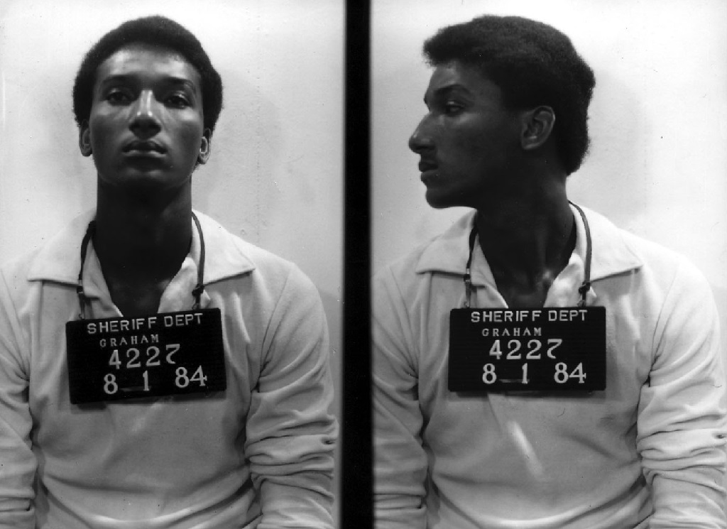 Police mugshot of Ronald Cotton from 1984, showing both front and side profile views used in official records