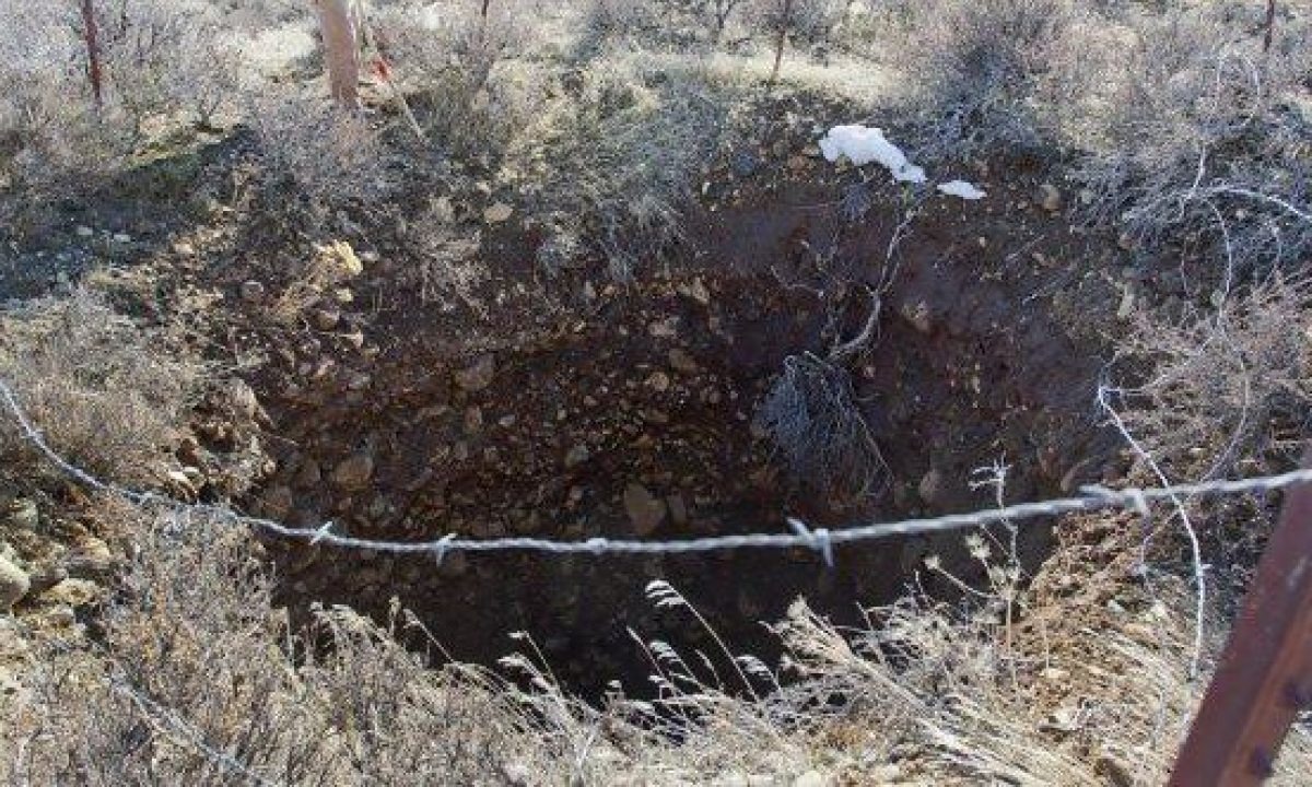 A man who called himself Mel Waters claimed there is a bottomless hole on his lawn.