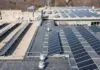 Image of solar panels on a warehouse showing the full potential of the latest rooftop solar project.