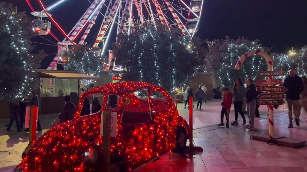 Festive lights, decorations, and attractions create a magical holiday atmosphere in Valletta during December
