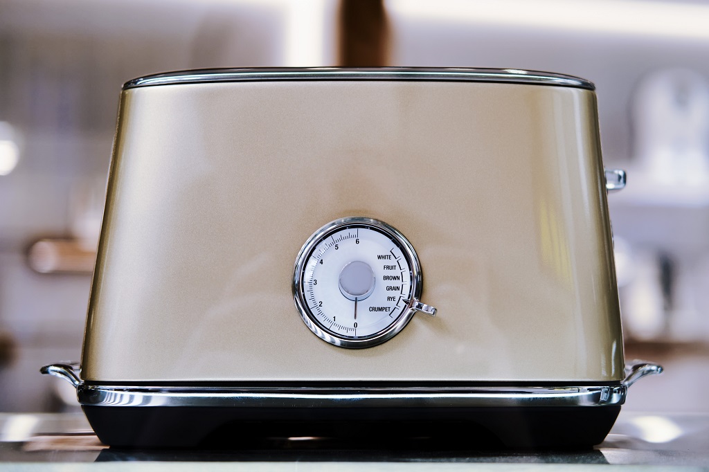 50s-style retro toaster with analog dial in modern kitchen setting
